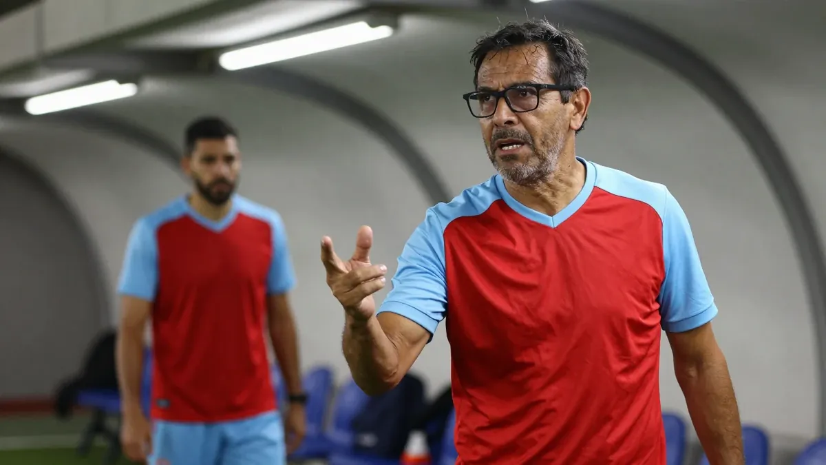 A 35-year-old, ruggedly-built, bespectacled assistant coach of Club Necaxa stands in the dimly-lit Estadio Victoria...